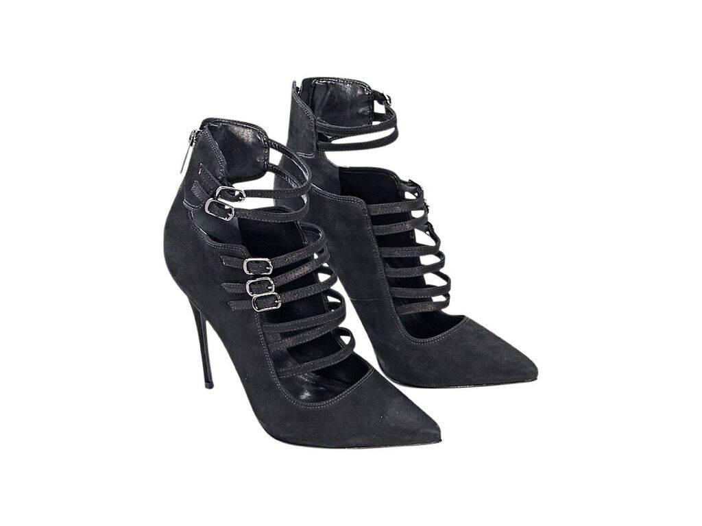Product details:  Black suede strappy pumps by Schutz.  Back zip closure.  Point toe.
Condition: Pre-owned. Very good.
Est. Retail $ 478.00