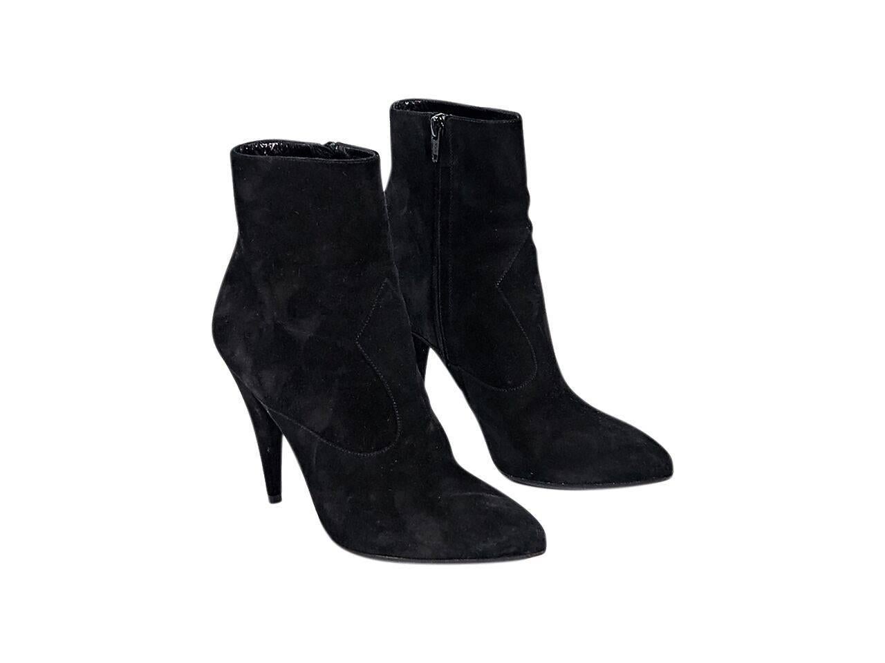 Product details:  Black suede ankle boots by Saint Laurent.  Western-style design.  Inner zip closure.  Almond toe.  Conical heel. 
Condition: Pre-owned. Very good.
Est. Retail $ 1,025.00