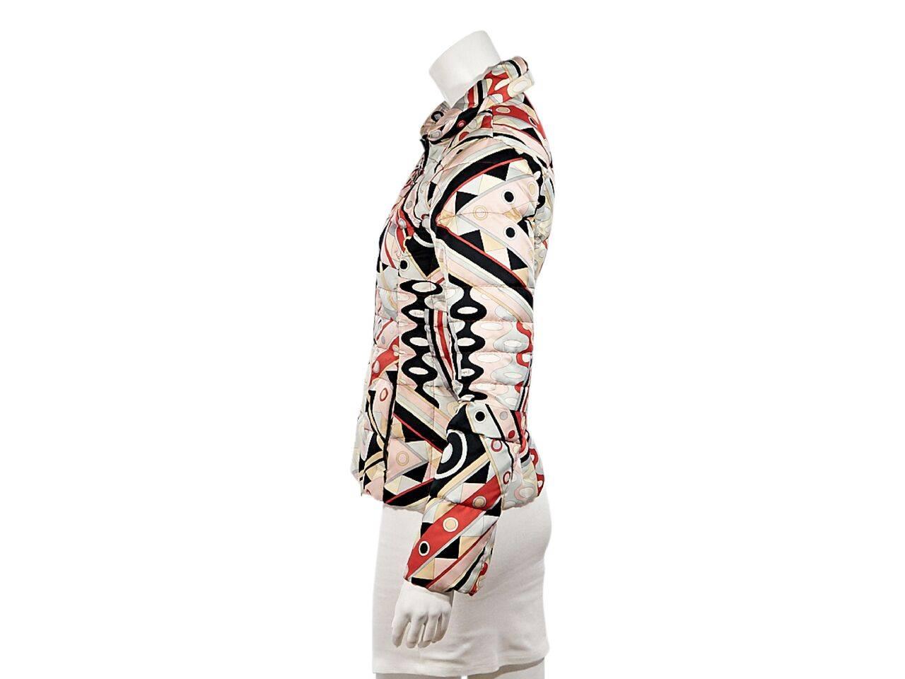 Product details:  Multicolor printed puffer jacket by Emilio Pucci.  Spread collar.  Long sleeves.  Zip-front closure.  On-seam zip waist pockets.  Princess seams create a flattering silhouette. 
Condition: Pre-owned. Very good.
Est. Retail $ 975.00