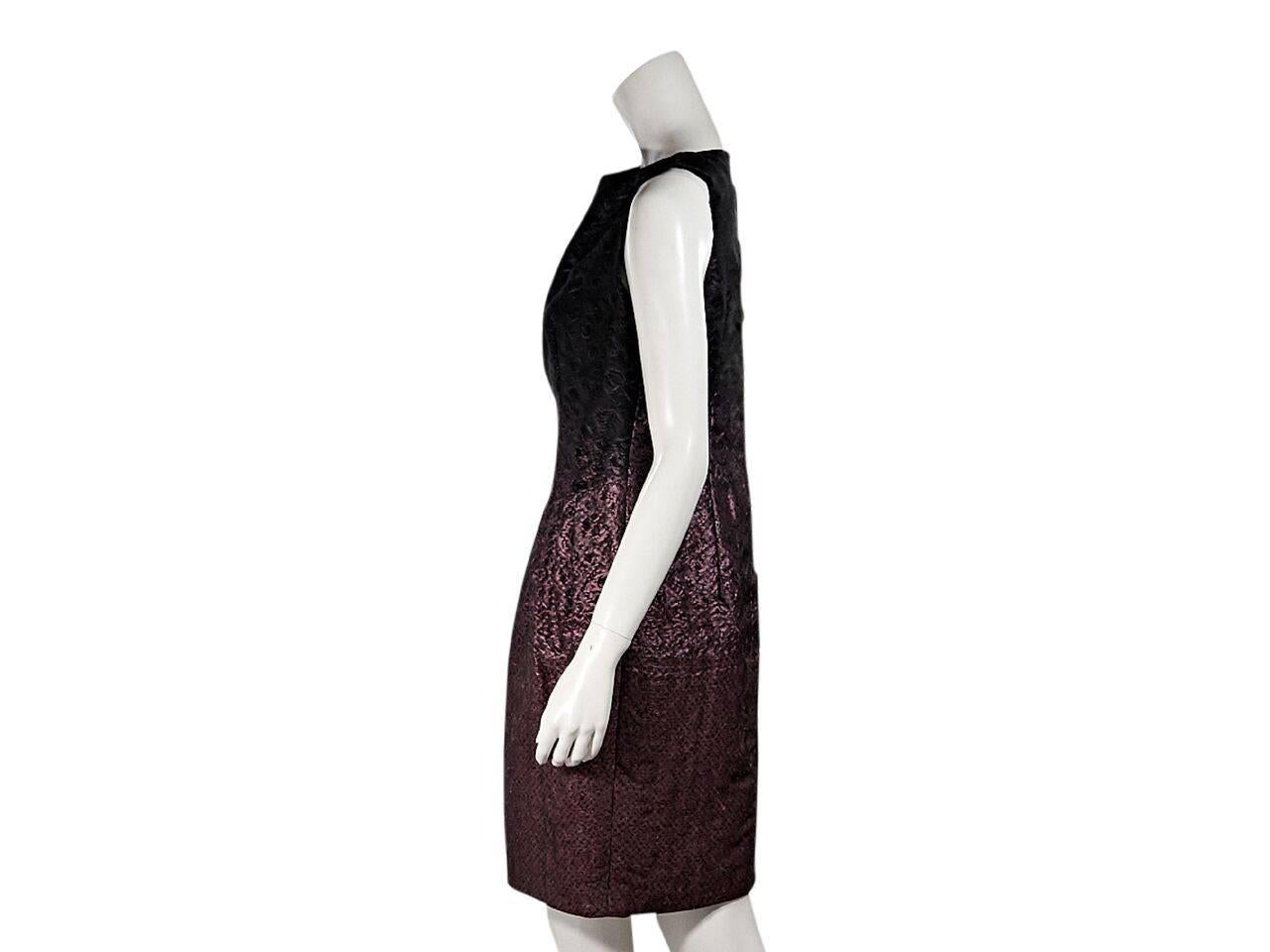 Product details:  Black and metallic purple woven dress by Escada.  Boatneck.  Sleeveless.  Side pleats.  Concealed back zip closure.  
Condition: Pre-owned. Very good.
Est. Retail $ 750.00