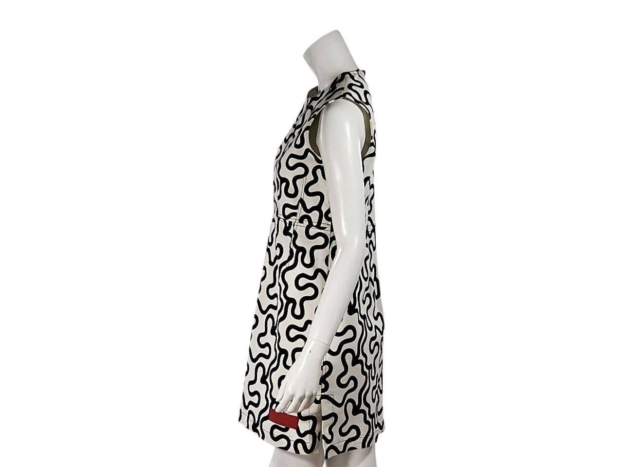 Product details:  Black and white swirl-printed mini dress by J.W. Anderson.  Crewneck.  Sleeveless.  Concealed back zip closure.  Side hem vents.  Fitted seams create a flattering silhouette. 
Condition: Pre-owned. Very good.
Est. Retail $ 698.00