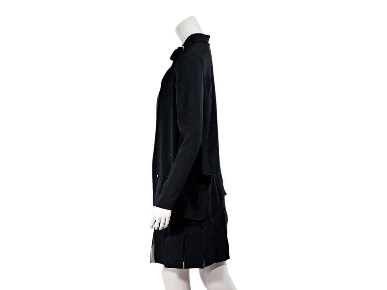 Product details: Black twofer dress by Proenza Schouler. Designed to look like a jacket and dress. Neck tie closure. Long sleeves. Drop waist. 
Condition: Pre-owned. New with tags.
Est. Retail $ 1,250.00