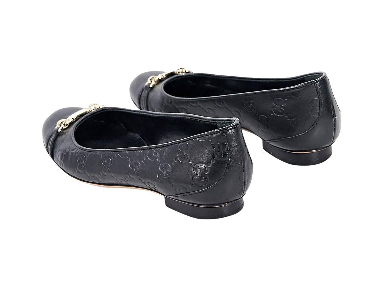 Product details:  Black leather GG embossed ballet flats by Gucci.  Horsebit detail accents vamp.  Round toe.  Slip-on style.  Goldtone hardware. 
Condition: Pre-owned. Very good.
Est. Retail $ 528.00