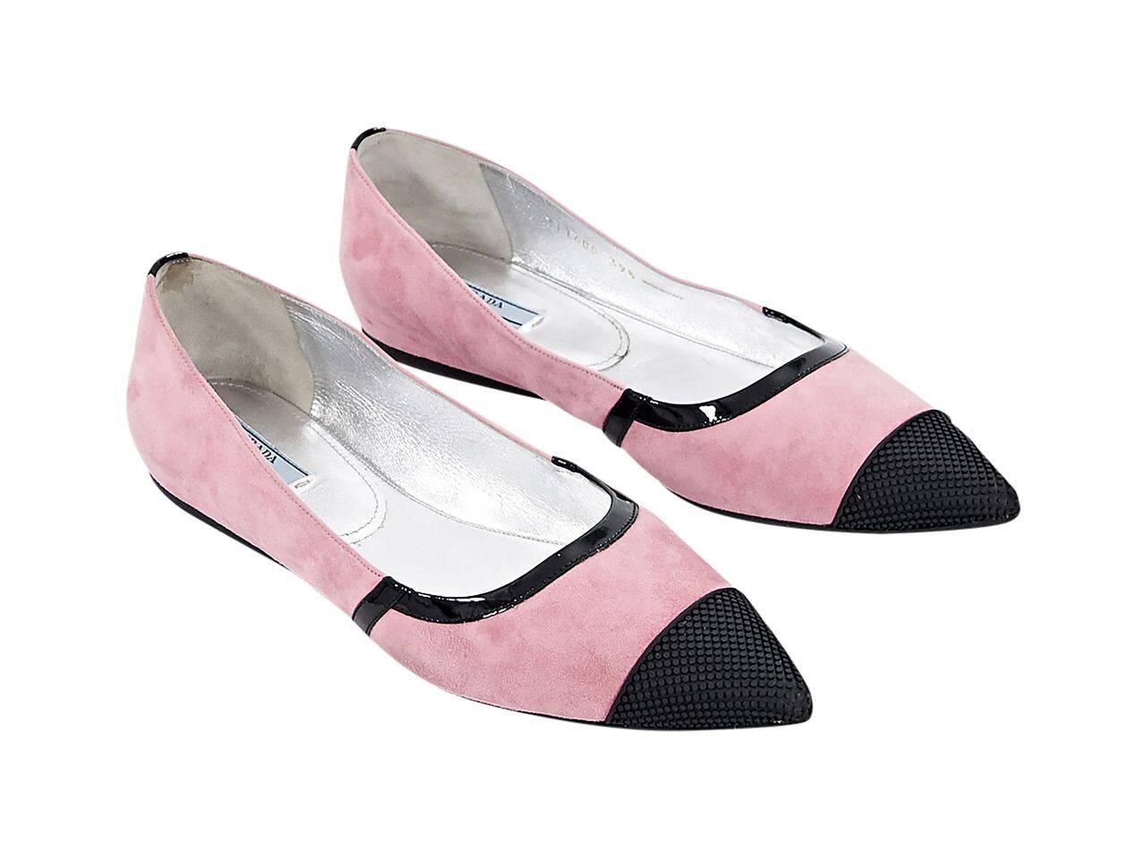 Product details:  Pink suede flats by Prada.  Trimmed with black patent leather.  Rubber point toe.  Slip-on style.  
Condition: Pre-owned. Very good.
Est. Retail $ 435.00