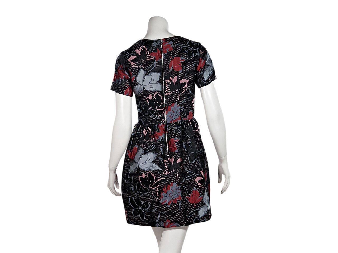 Product details:  Multicolor floral and polka dot fit-and-flare dress by Suno.  Roundneck.  Short sleeves.  Exposed back zip closure.  
Condition: Pre-owned. Very good.
Est. Retail $ 845.00