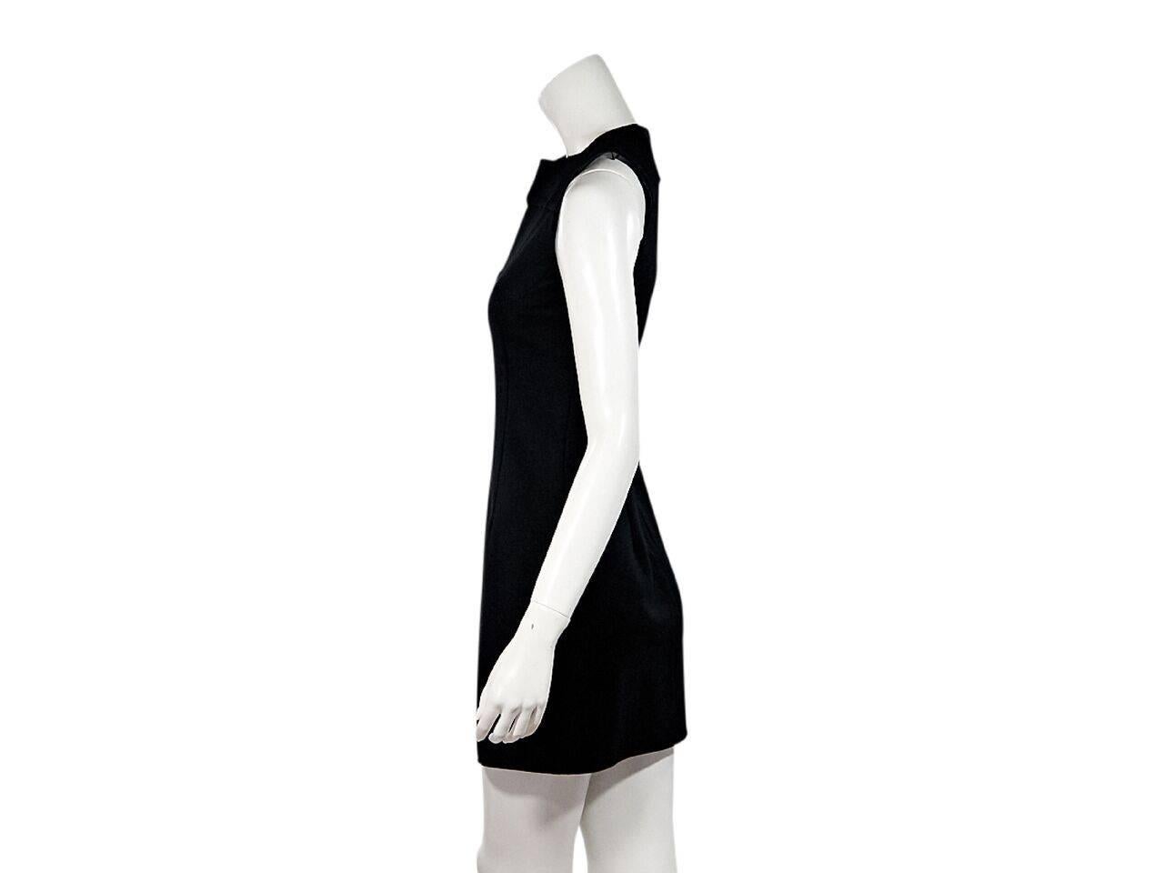 Product details:  Black sheath dress by Prada.  Roundneck.  Sleeveless.  Seam work creates a flattering silhouette.  Exposed back zip closure.  
Condition: Pre-owned. Very good.
Est. Retail $ 1,198.00