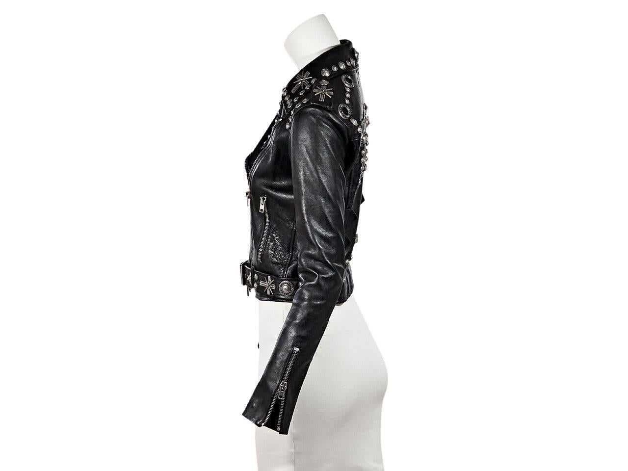 Product details:  Black studded leather moto jacket by Fausto Puglisli.  Notched lapel.  Long sleeves.  Zip cuffs.  Asymmetrical zip-front closure.  Waist zip pockets.  Adjustable belted waist.
Condition: Pre-owned. Very good.
Est. Retail $ 4,917.00