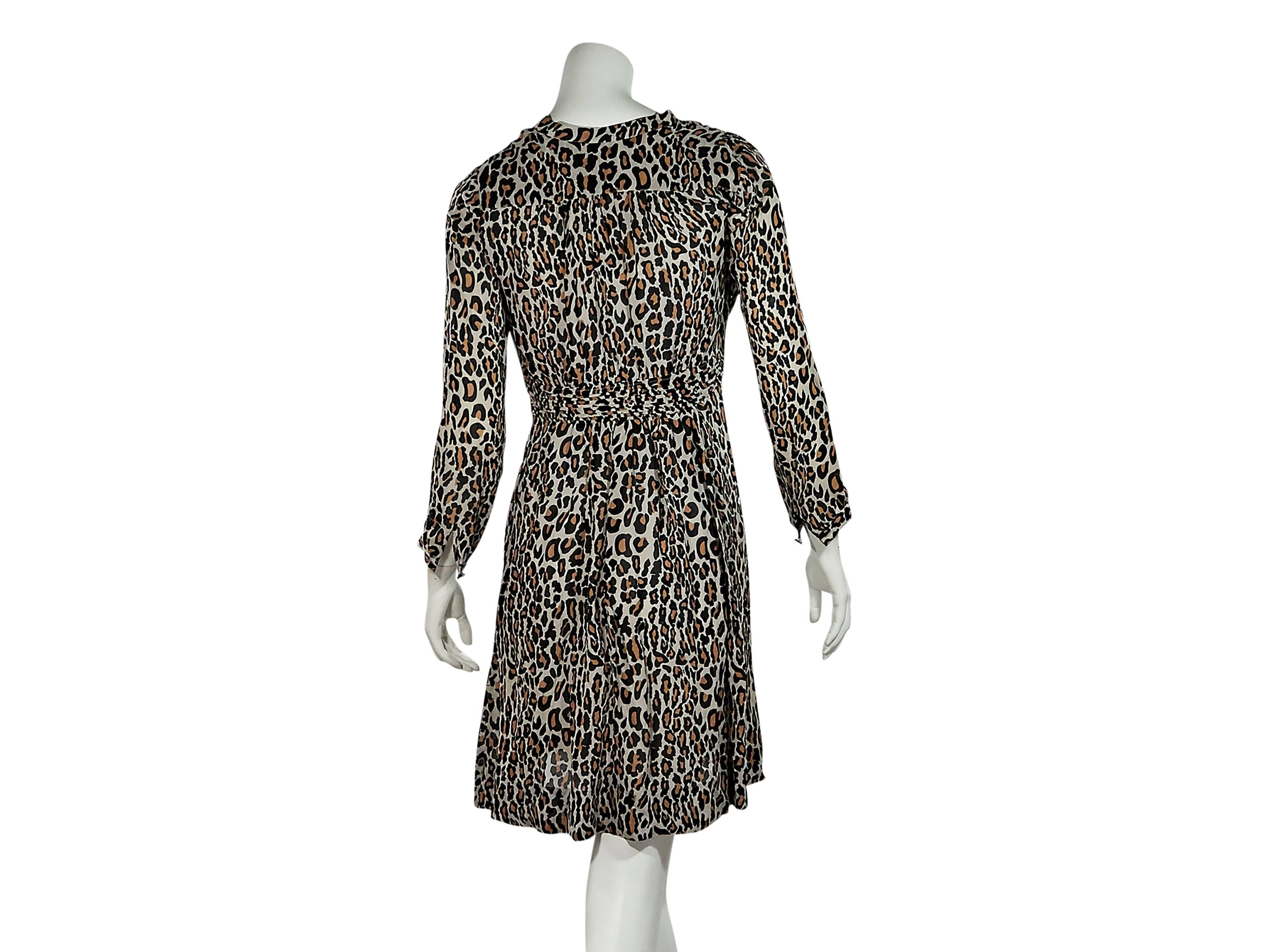 Product details:  Multicolor leopard-print Herta dress by Baum und Pferdgarten.  V-neck.  Bracelet-length sleeves.  Button placket.  Pleated Empire waist. Bust is 30