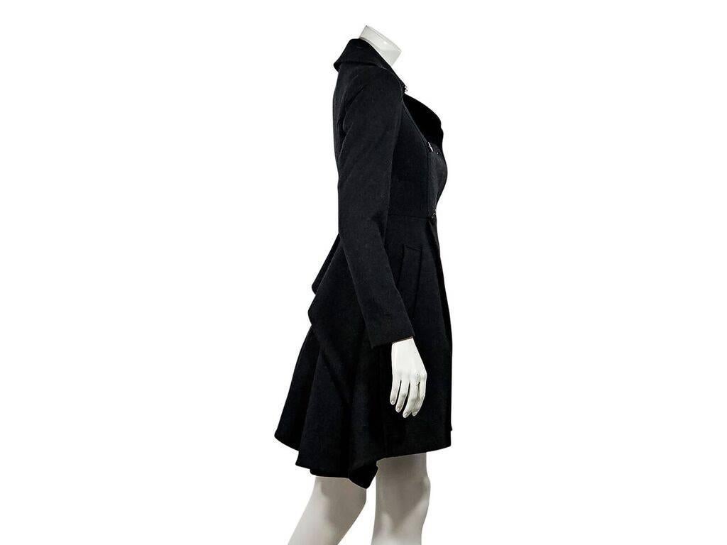 Product details:  Grey wool A-line coat by All Saints.  Notched lapel.  Long sleeves.  Double-breasted button-front closure.  Waist slide pockets.  High-low peplum back. 
Condition: Pre-owned. Very good.
Est. Retail $ 798.00