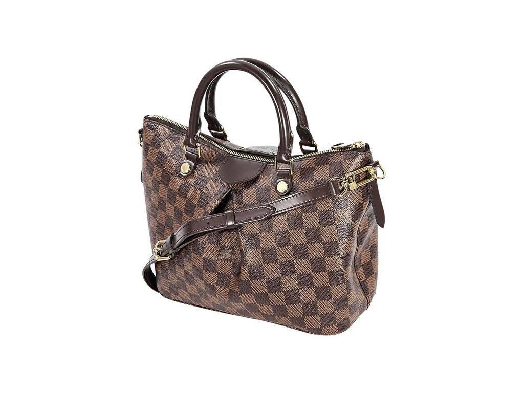 Product details:  Brown damier ebene Siena PM satchel by Louis Vuitton.  Dual carry handles.  Detachable, adjustable crossbody strap.  Top zip closure.  Lined interior with inner slide pockets.  Goldtone hardware.  12