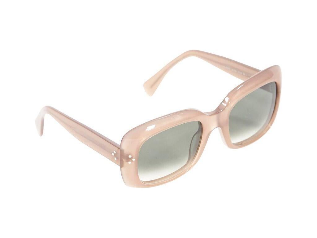 Product details:  Taupe lucite square sunglasses by Celine.  Gradient lenses.  Soft case included.  
Condition: Pre-owned. Very good.
Est. Retail $ 698.00