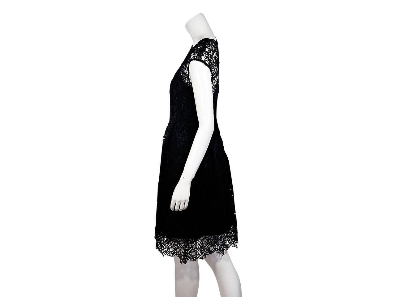 Product details:  Black crochet sheath dress by Lela Rose.  Roundneck.  Cap sleeves.  Concealed zip back closure.  
Condition: Pre-owned. New with tags.
Est. Retail $ 698.00