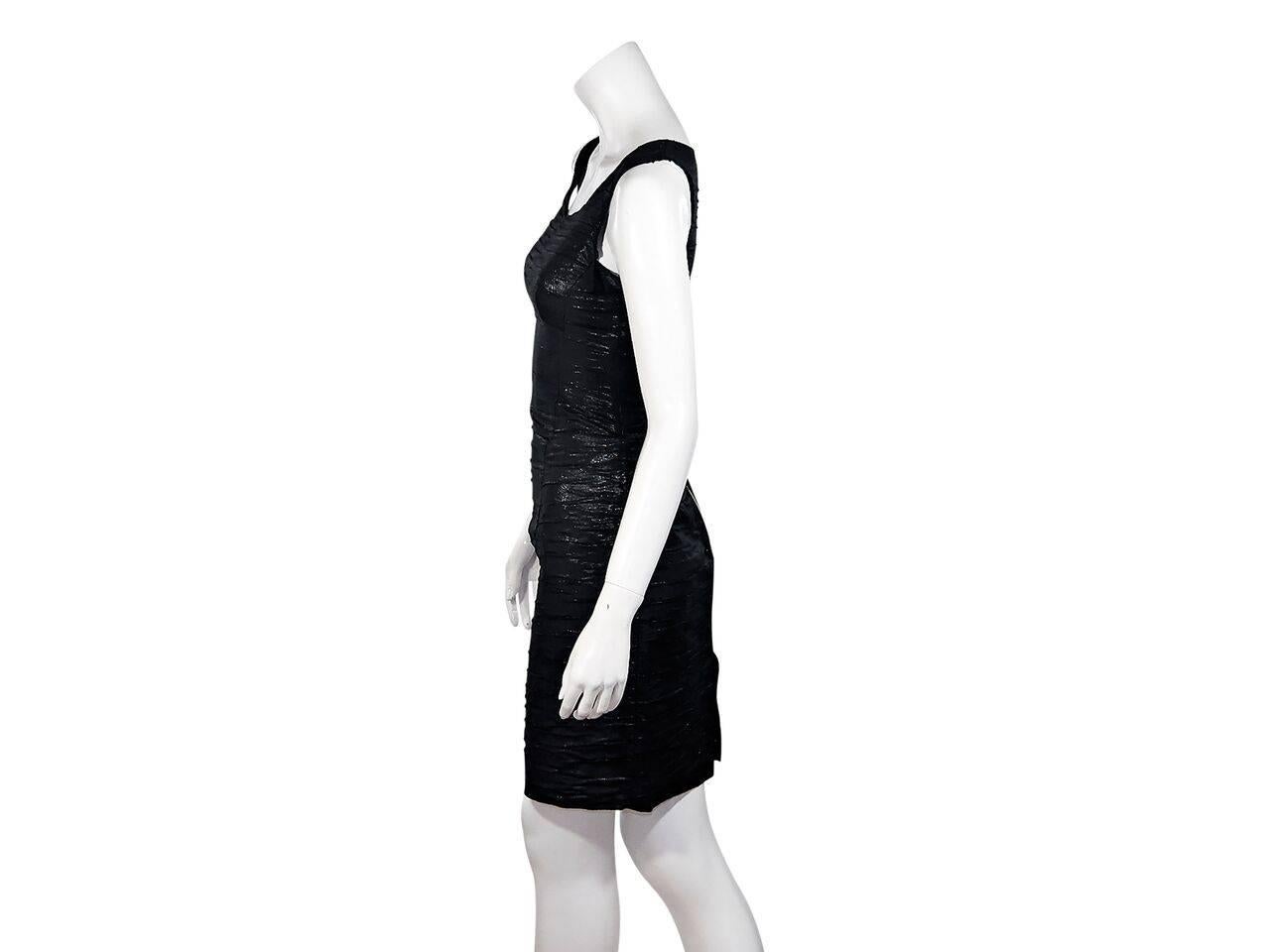 Product details:  Metallic black sheath dress by D&G.  Scoopneck.  Sleeveless.  Exposed back zip closure.  Center back hem slit.  Label size IT36.
Condition: Pre-owned. Very good.
Est. Retail $ 498.00