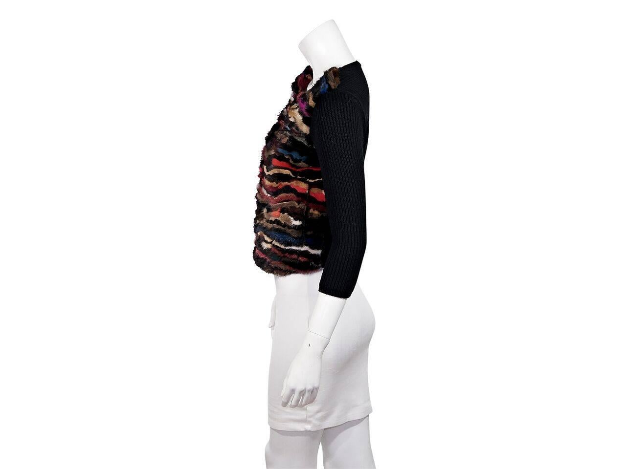 Product details:  Multicolor mink fur-front cardigan by Diane von Furstenberg.  Roundneck.  Three-quarter length sleeves.  Concealed front closure.  Ribbed knit back.
Condition: Pre-owned. Very good.
Est. Retail $ 898.00