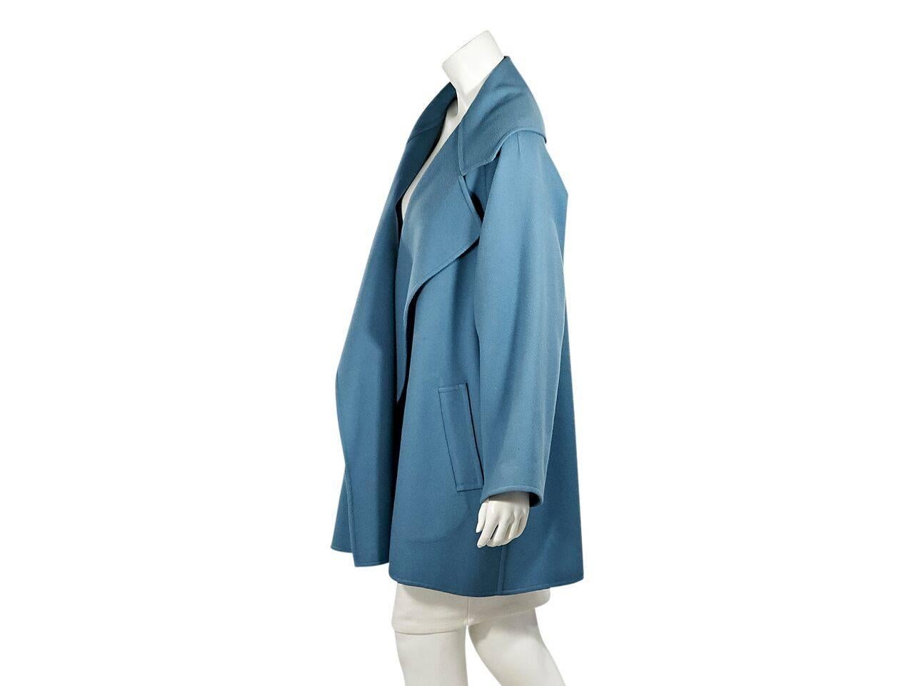 Product details:  Blue wool coat by Salvatore Ferragamo. Notched lapel.  Long sleeves.  Open front.  Waist slide pockets.  
Condition: Pre-owned. Very good.
Est. Retail $ 1,875.00