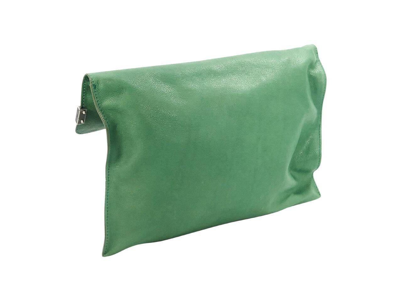 Product details:  Green pebbled leather foldover clutch by Stuart Wetizman.  Zip closure under front flap.  Silvertone hardware.  13.25