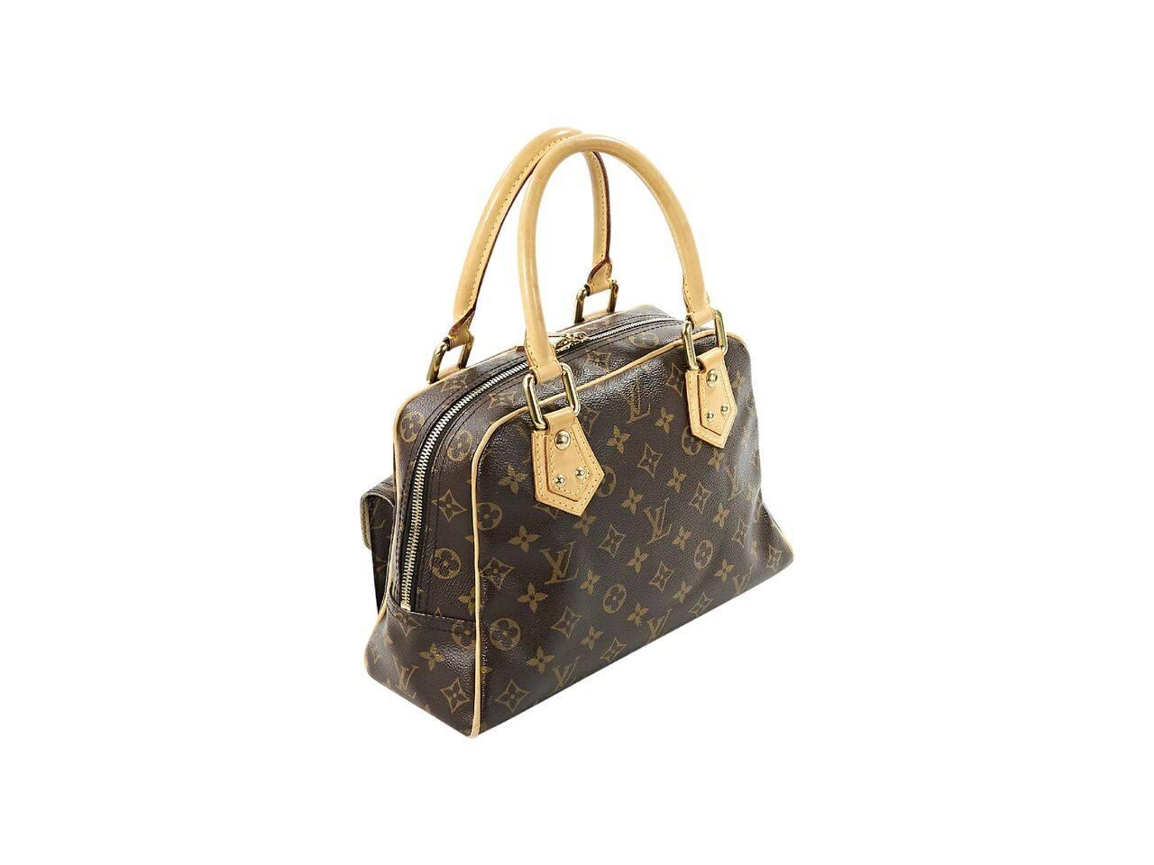 Product details:  Brown coated canvas monogram Manhattan PM handbag by Louis Vuitton.  Top carry handles.  Top zip closure.  Lined interior with slide pocket.  Front exterior buckle flap pockets.  Goldtone hardware.  11.5