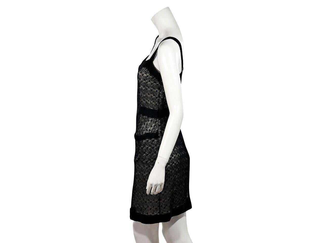 Product details:  Black knit dress by Missoni.  Accented with sequins.  Squareneck.  Sleeveless.  Concealed side zip closure.  Label size IT 42.
Condition: Pre-owned. Very good.
Est. Retail $ 748.00
