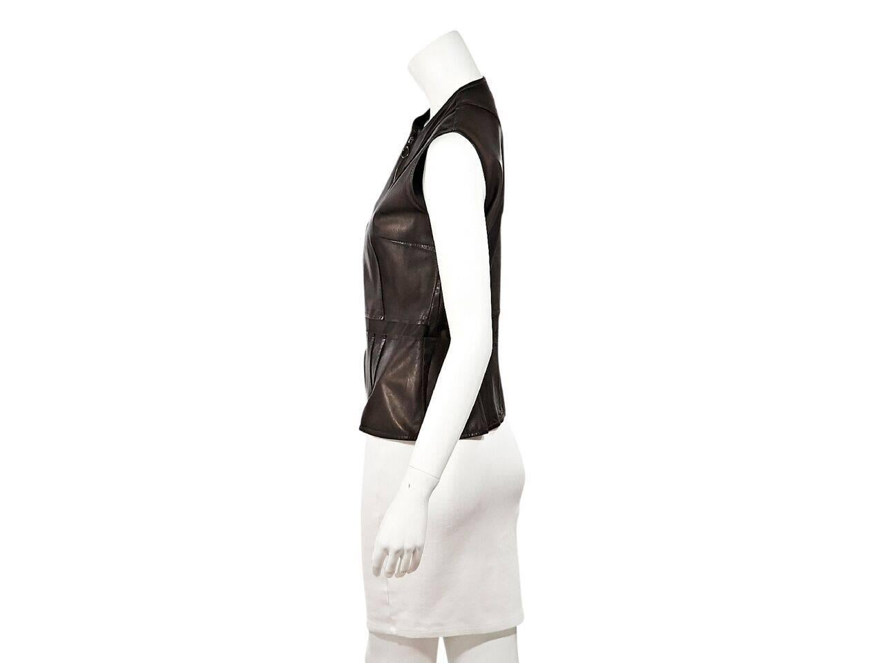 Product details:  Brown leather vest by Lanvin.  Crewneck.  Sleeveless.  Zip-front closure.  Antiqued goldtone hardware.  Label size FR 40.
Condition: Pre-owned. Very good.
Est. Retail $ 998.00