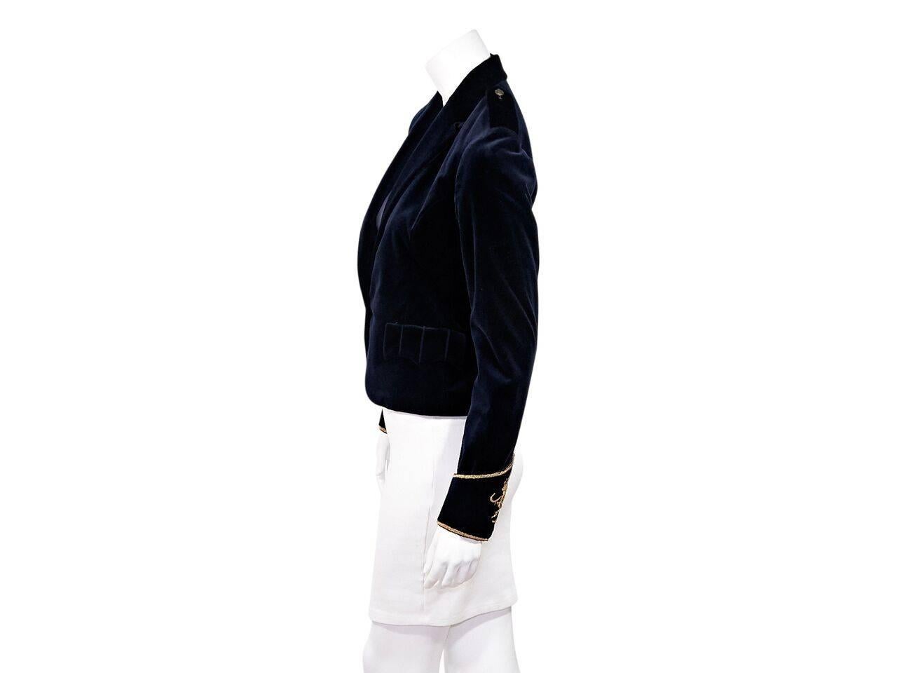 Product details:  Navy blue velvet blazer by Ralph Lauren.  Shoulder epaulettes.  Notched lapel.  Long sleeves.  Embroidered and embellished metallic gold cuffs.  Single button closure.  Flap waist pockets.  
Condition: Pre-owned. Very good.
Est.