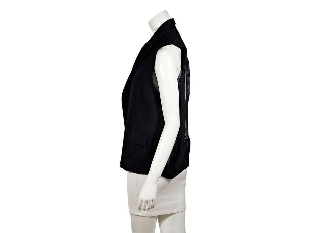 Product details:  Black vest by Alexander Wang.  Notched lapel.  Long sleeves.  Button-front closure.  Waist flap pockets.  Semi-sheer pleated back.  
Condition: Pre-owned. Very good.
Est. Retail $ 698.00