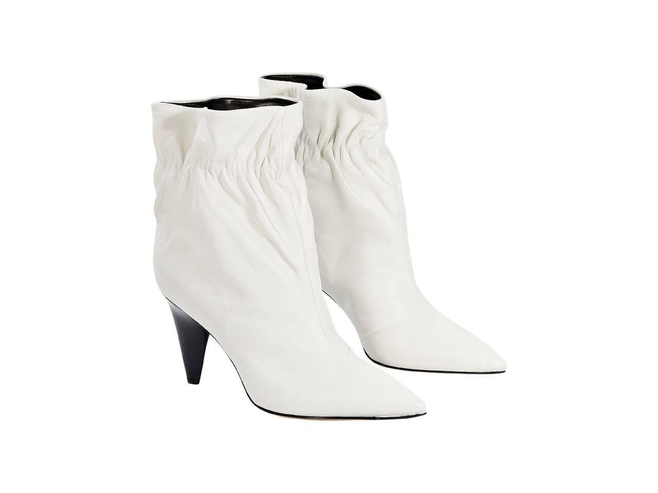 Product details:  White leather Carmen ankle boots by Derek Lam.  Elasticized top line.  Point toe.  Conical heel.  Pull-on style. 
Condition: Pre-owned. Very good.
Est. Retail $ 950.00