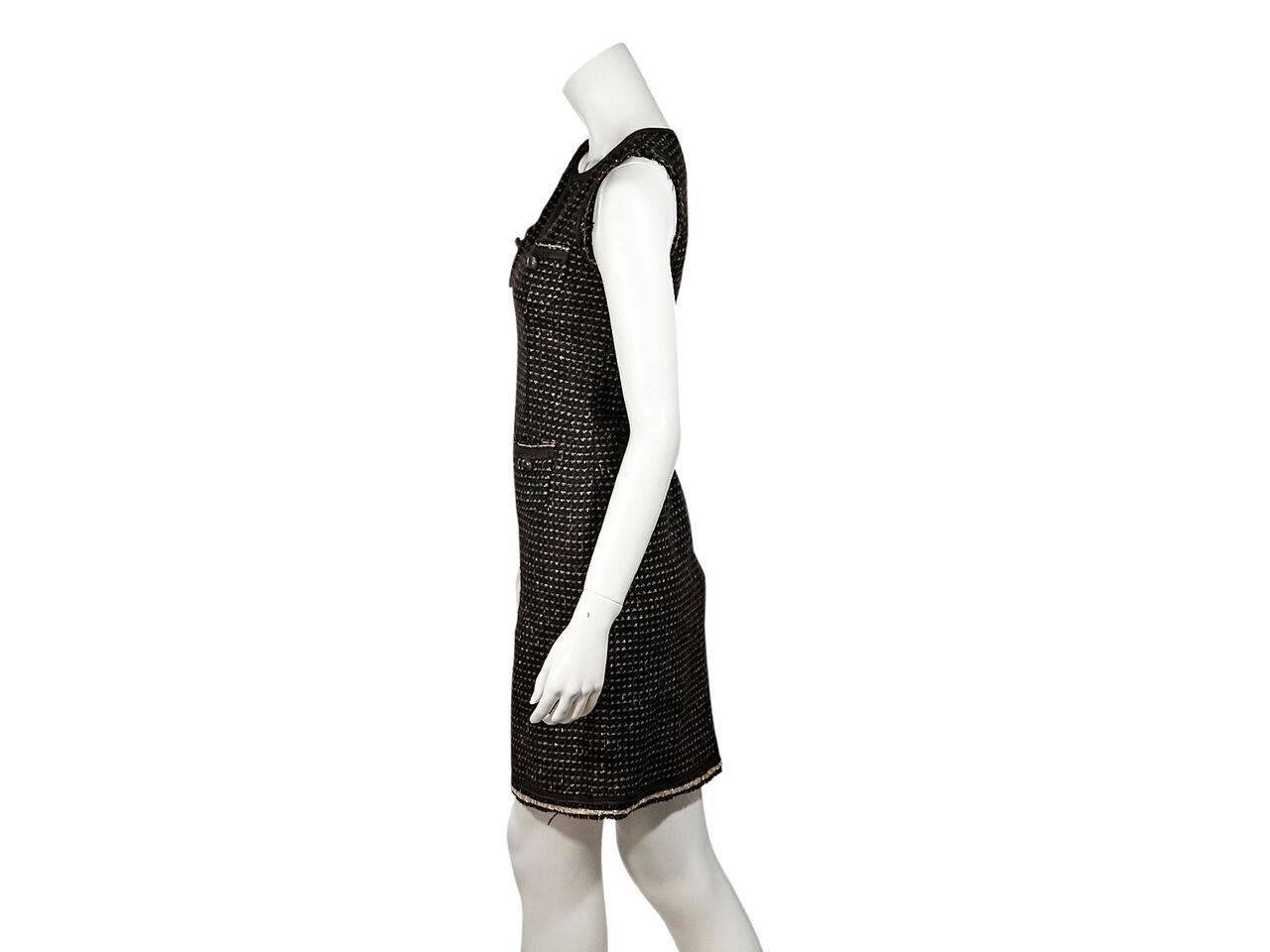 Product details:  Brown tweed sheath dress by Moschino.  Split scoopneck.  Sleeveless.  Front patch pockets.  Concealed zip closure.  
Condition: Pre-owned. Very good.
Est. Retail $ 728.00