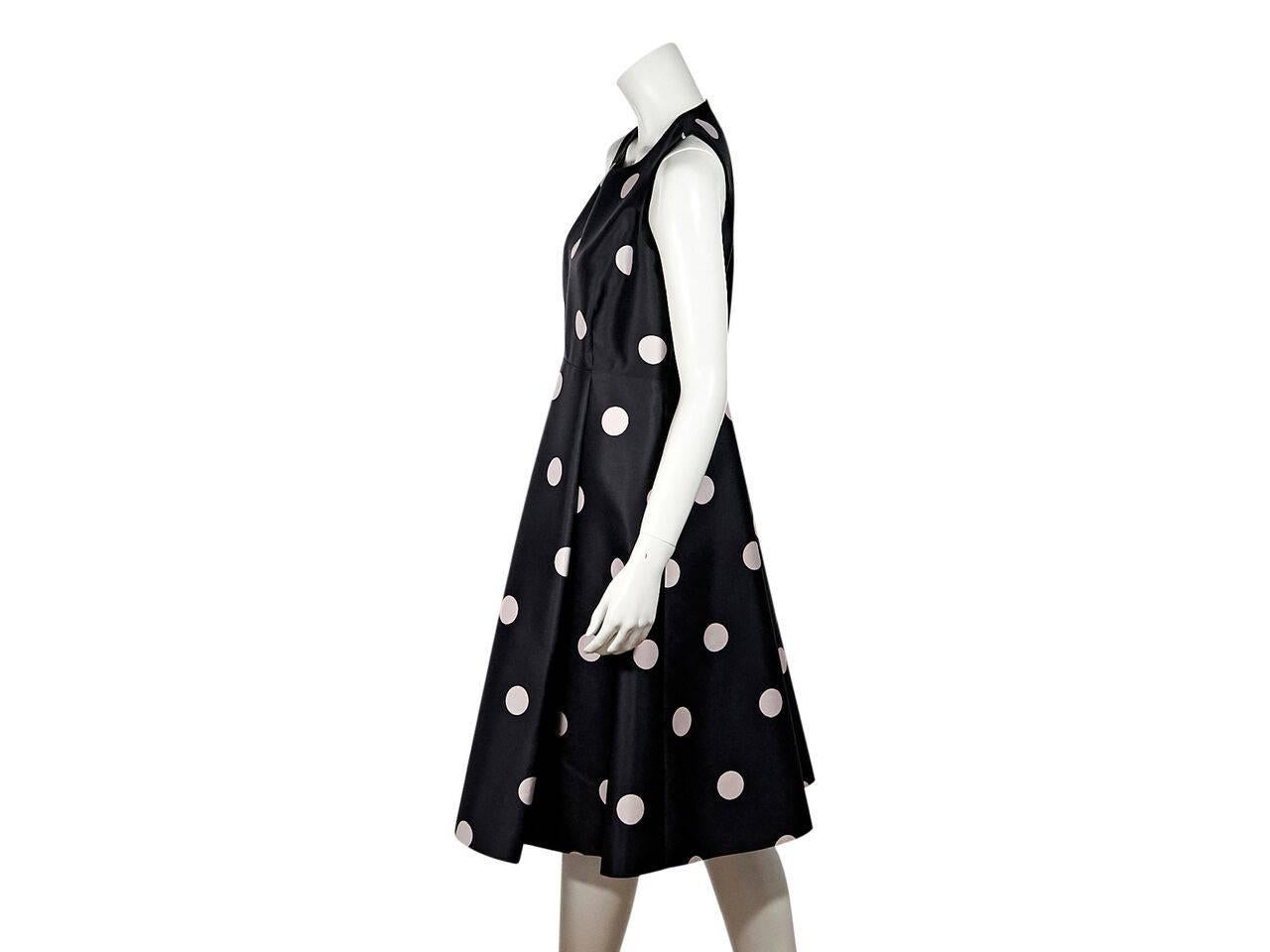 Product details:  Black and pale pink polka-dot A-line dress by Kate Spade New York.  Jewelneck.  Sleeveless.  Concealed back zip closure. 
Condition: Pre-owned. New with tags.
Est. Retail $ 478.00