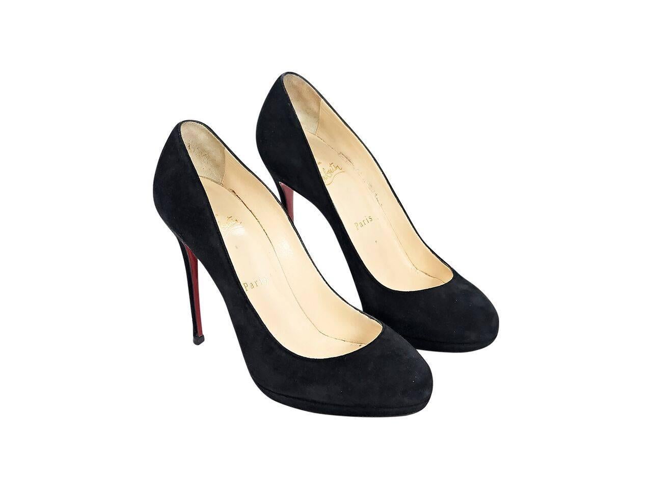 Product details:  Black suede platform pumps by Christian Louboutin.  Round toe.  Iconic red sole.  Slip-on style.
Condition: Pre-owned. Very good.
Est. Retail $ 1,125.00