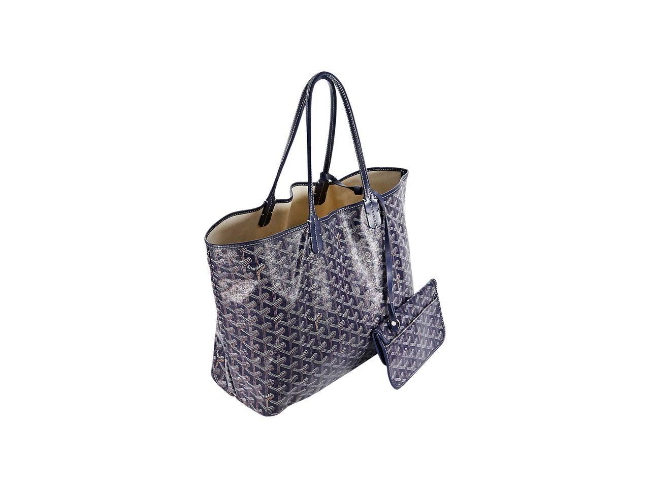 Product details:  Navy blue St. Louis PM tote bag by Goyard.  Dual shoulder straps.  Open top.  Attached matching snap pouch.  14