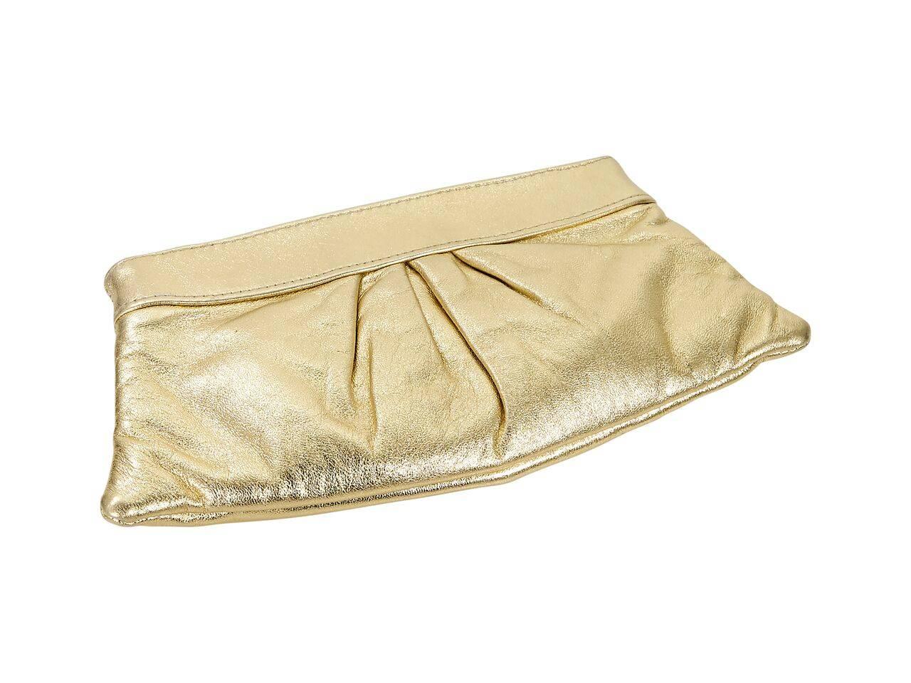 Product details:  Metallic gold clutch by Lauren Merkin.  Accented with front and back pleats.  Hinged top closure.  Lined interior.  
Condition: Pre-owned. Very good.
Est. Retail $ 225.00