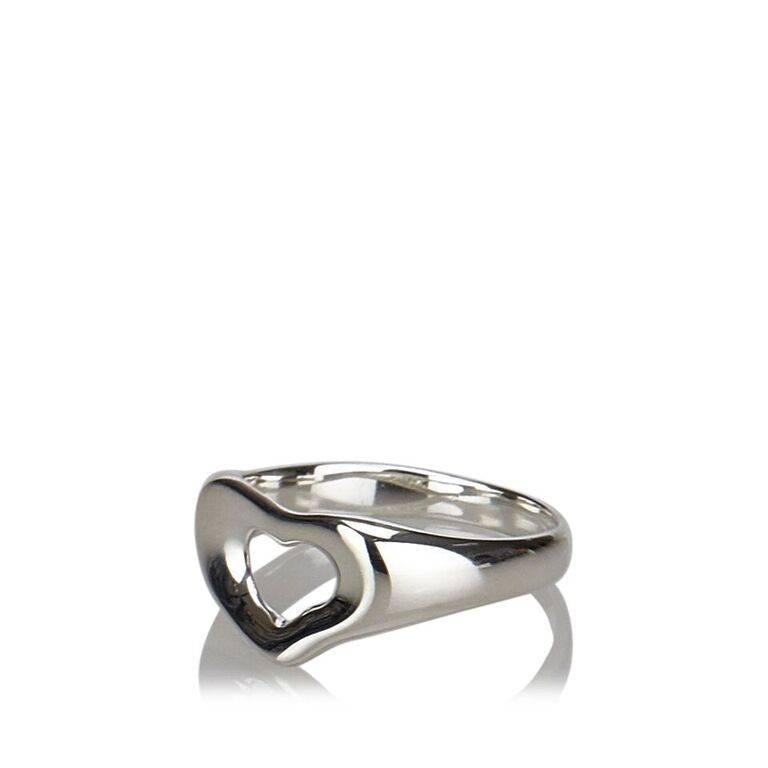 Product details:  Sterling silver open heart ring by Tiffany & Co.  Ring size US 5/Euro 49.
Condition: Pre-owned. Excellent. 
Est. Retail $ 255.00
