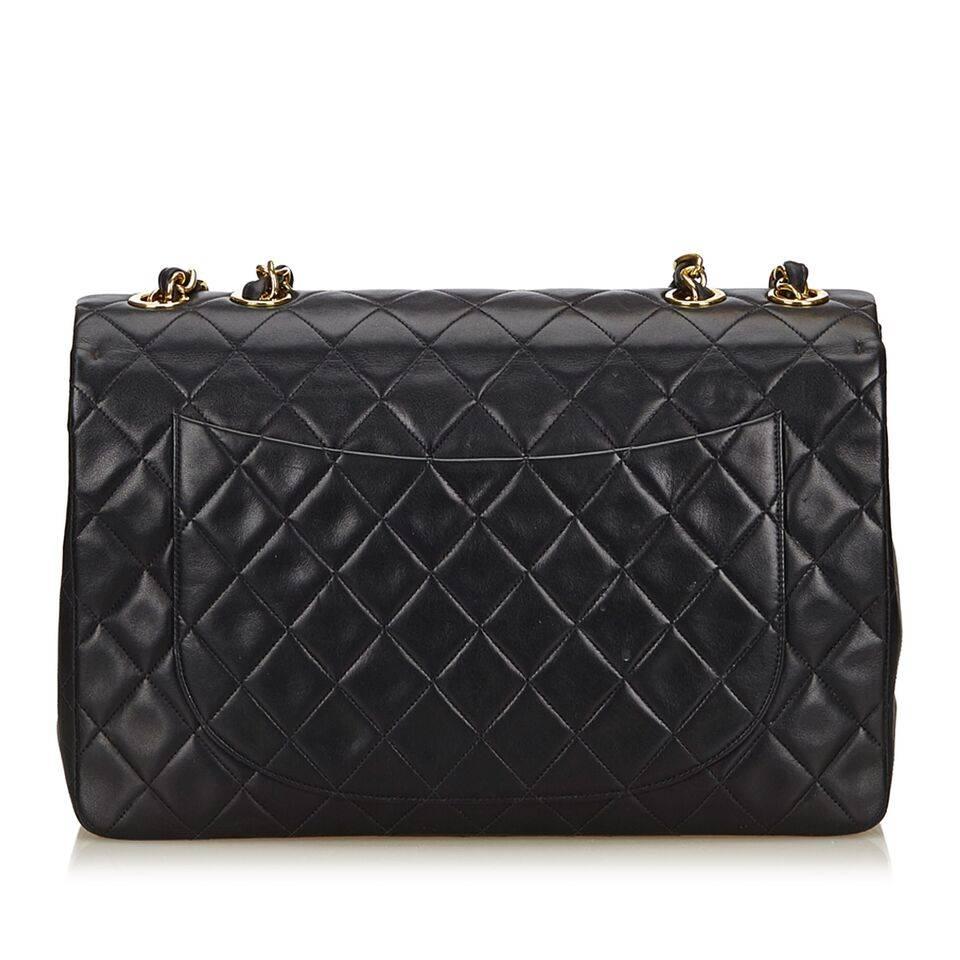 Black Chanel Quilted Leather Maxi Classic Flap Bag In Good Condition In New York, NY