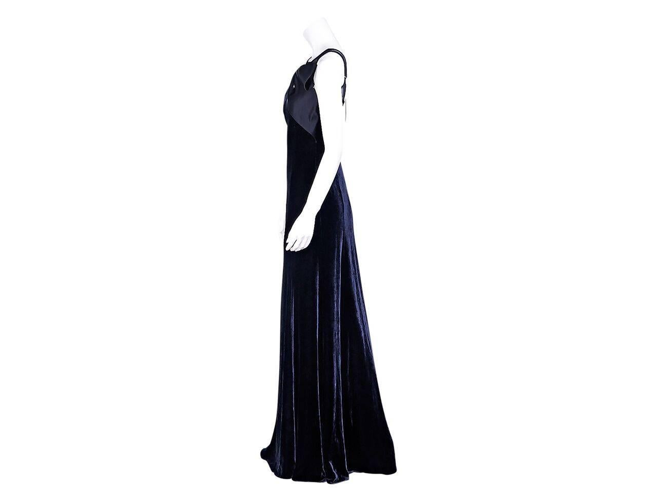 Product details:  Navy blue velvet gown by Armani Collezioni.  Wide boatneck.  Sleeveless.  Draped bodice detail.  Scoopback.  Concealed back zip closure.  
Condition: Pre-owned. New with tags.
Est. Retail $ 1,495.00