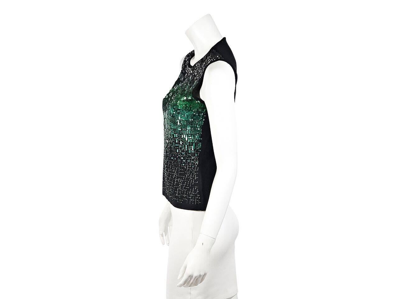 Product details:  Multicolor sequin front wool/cashmere-blend top by Oscar de la Renta.  Jewelneck.  Sleeveless.  Single button back with keyhole cutout.  Pullover style. 
Condition: Pre-owned. Very good.
Est. Retail $ 578.00
