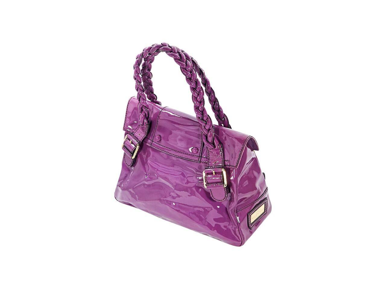 Product details:  Purple patent leather Lacca Histoire bag by Valentino.  Dual braided carry handles.  Front flap with tab closure.  Lined interior with inner zip pocket.  Front exterior flap pockets.  Goldtone hardware.  15"L x 11.5"H x