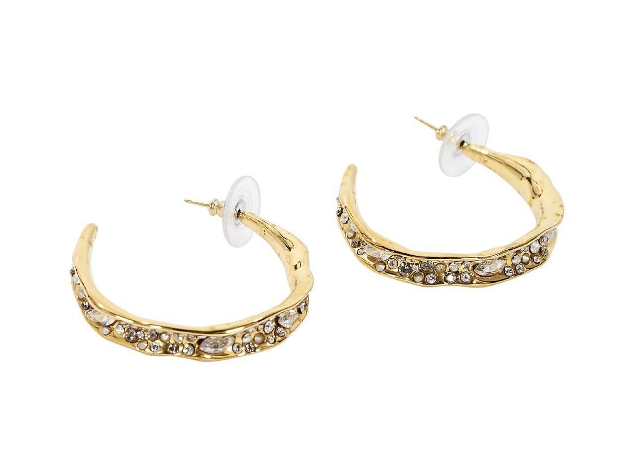 Product details:  Goldtone hoop earrings by Alexis Bittar.  Embellished with crystals.  Post closure.  
Condition: Pre-owned. Very good.
Est. Retail $ 398.00