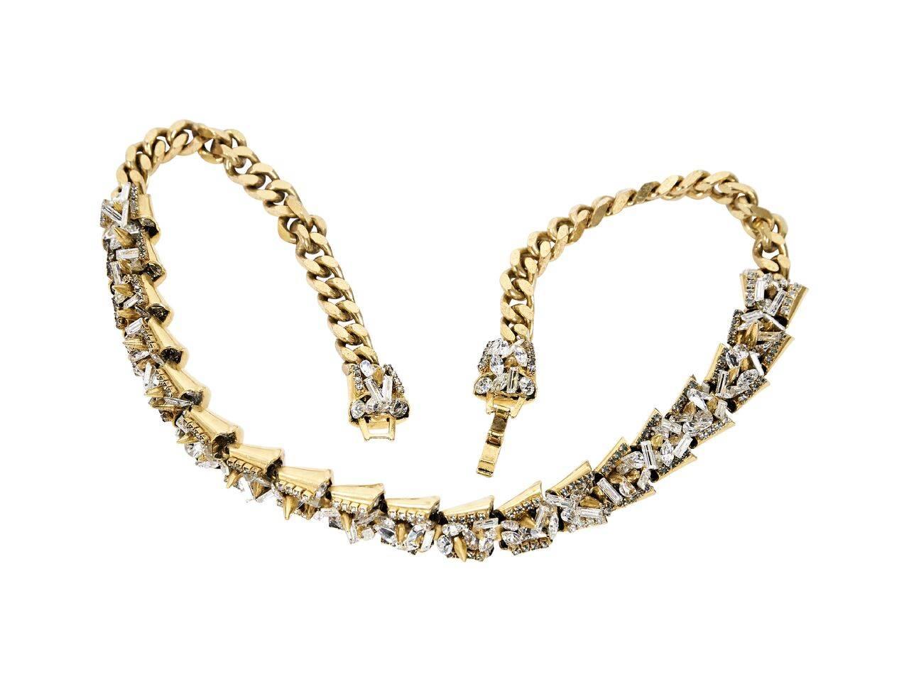 Product details:  Goldtone chain necklace by Erickson Beamon.  Embellished with crystals.  Flip-clasp closure. 
Condition: Pre-owned. Very good.
Est. Retail $ 678.00