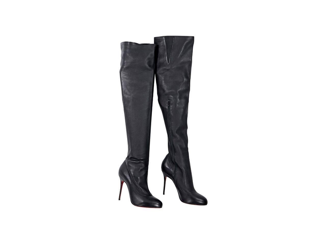 Product details:  Black leather over-the-knee boots by Christian Louboutin.  Inner half zip closure.  Round toe.  Iconic red sole. 
Condition: Pre-owned. Very good.
Est. Retail $ 2,000.00