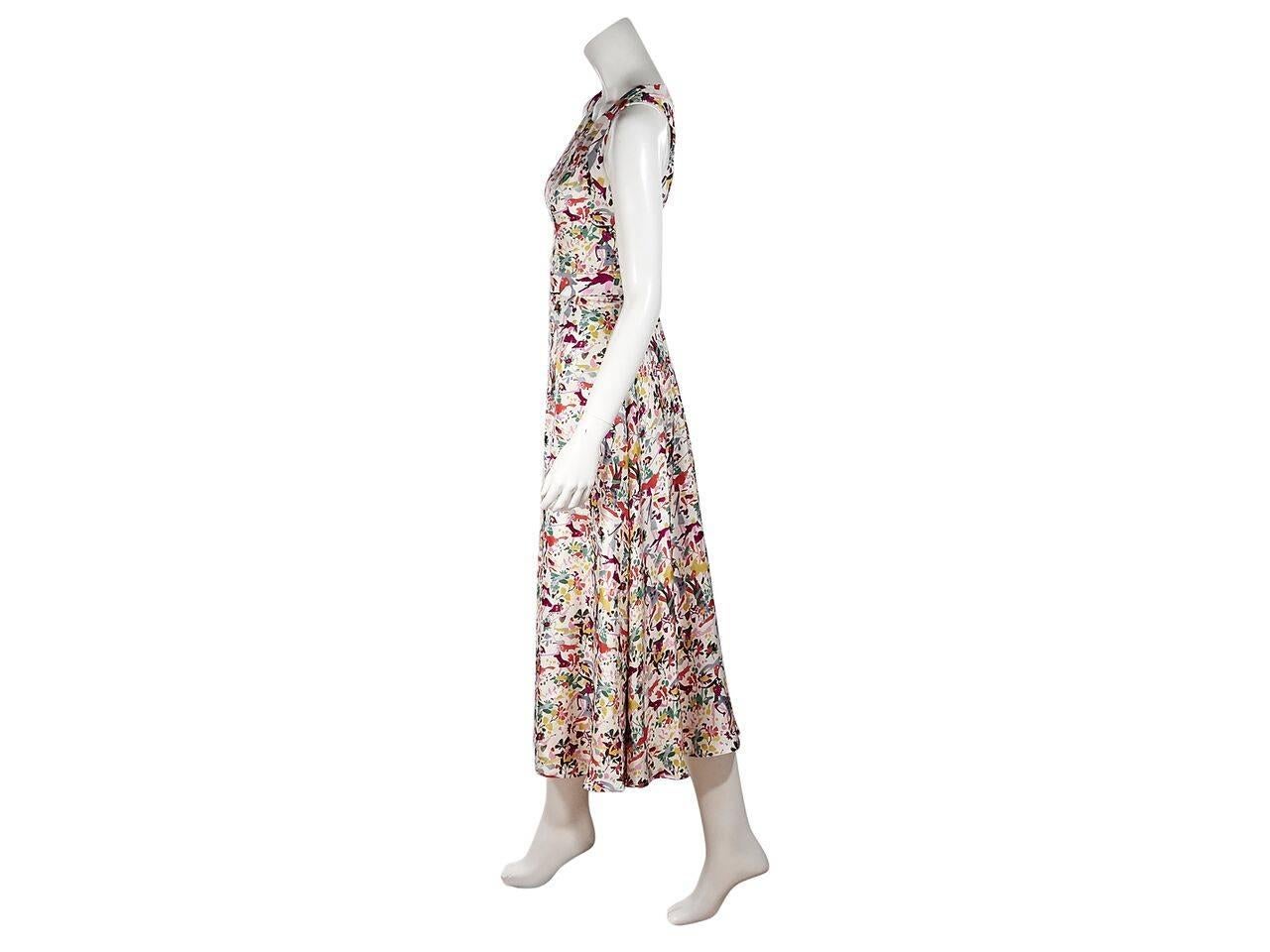 Product details:  Multicolor printed silk midi dress by Carolina Herrera.  Scoopneck.  Sleeveless.  Banded waist.  Concealed back zip closure.  
Condition: Pre-owned. New with tags.
Est. Retail $ 2,790.00