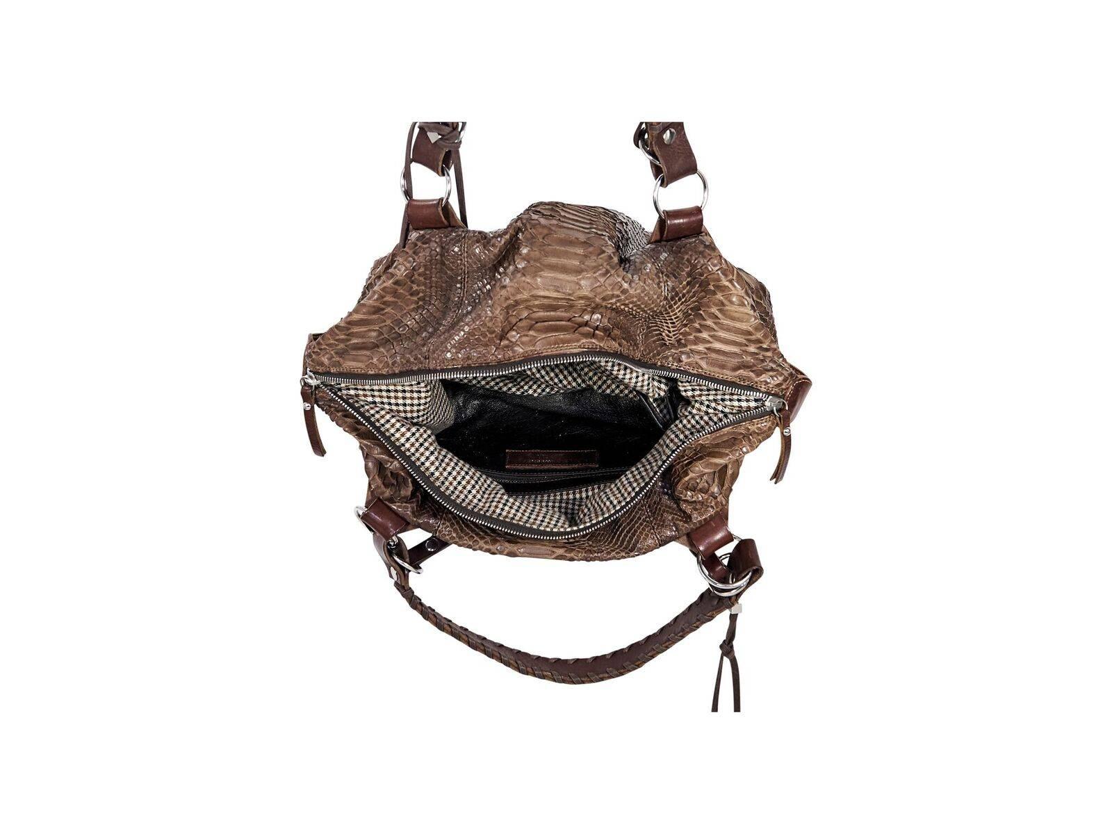 Product details:  Brown python shoulder bag by Pauric Sweeney.  Dual shoulder straps.  Top zip closure.  Lined interior with zip and slide pockets.  Protective metal feet.  Silvertone hardware.  17