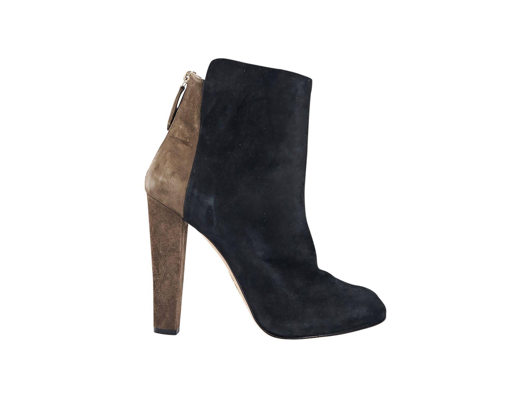 Product details:  Black and brown suede ankle boots by Aquazzura.  Block heel. Round toe.  Back zip closure.  
Condition: Pre-owned. Very good.
Est. Retail $1000