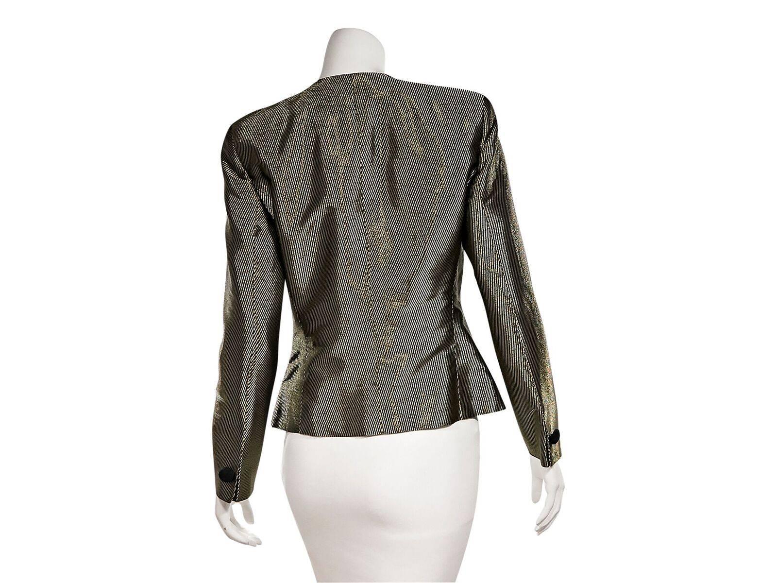 Product details:  Metallic gold and black twill blazer by Giorgio Armani.  Crewneck.  Long sleeves.  Single button cuffs.  Button-front closure.  Princess seams create a flattering silhouette. 
Condition: Pre-owned. Very good.
Est. Retail $525