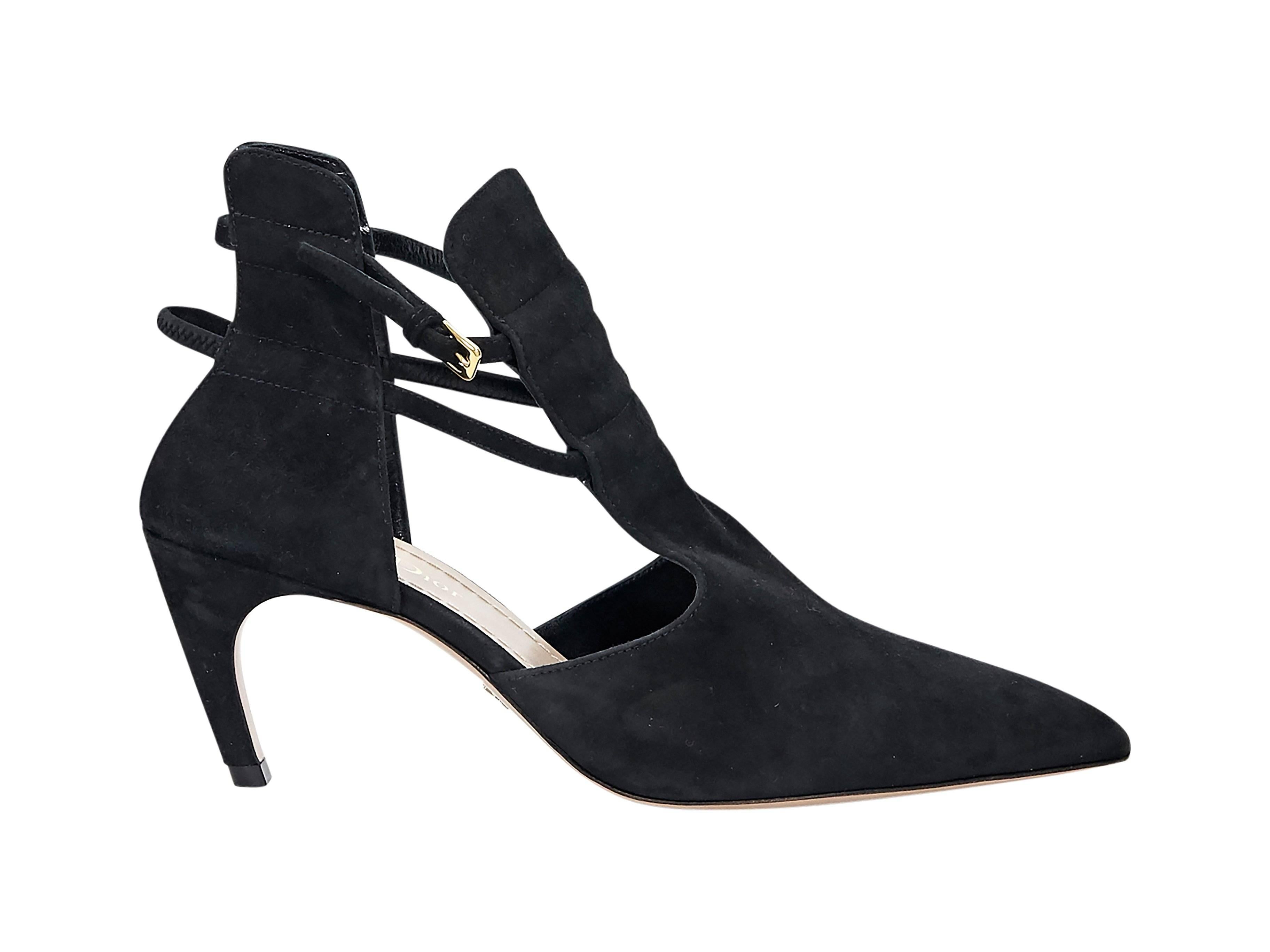 Product details:  Black suede kitten heels by Christian Dior.  Adjustable ankle strap.  Cutout sides.  Point toe. 
Condition: Pre-owned. Very good.
Est. Retail $890