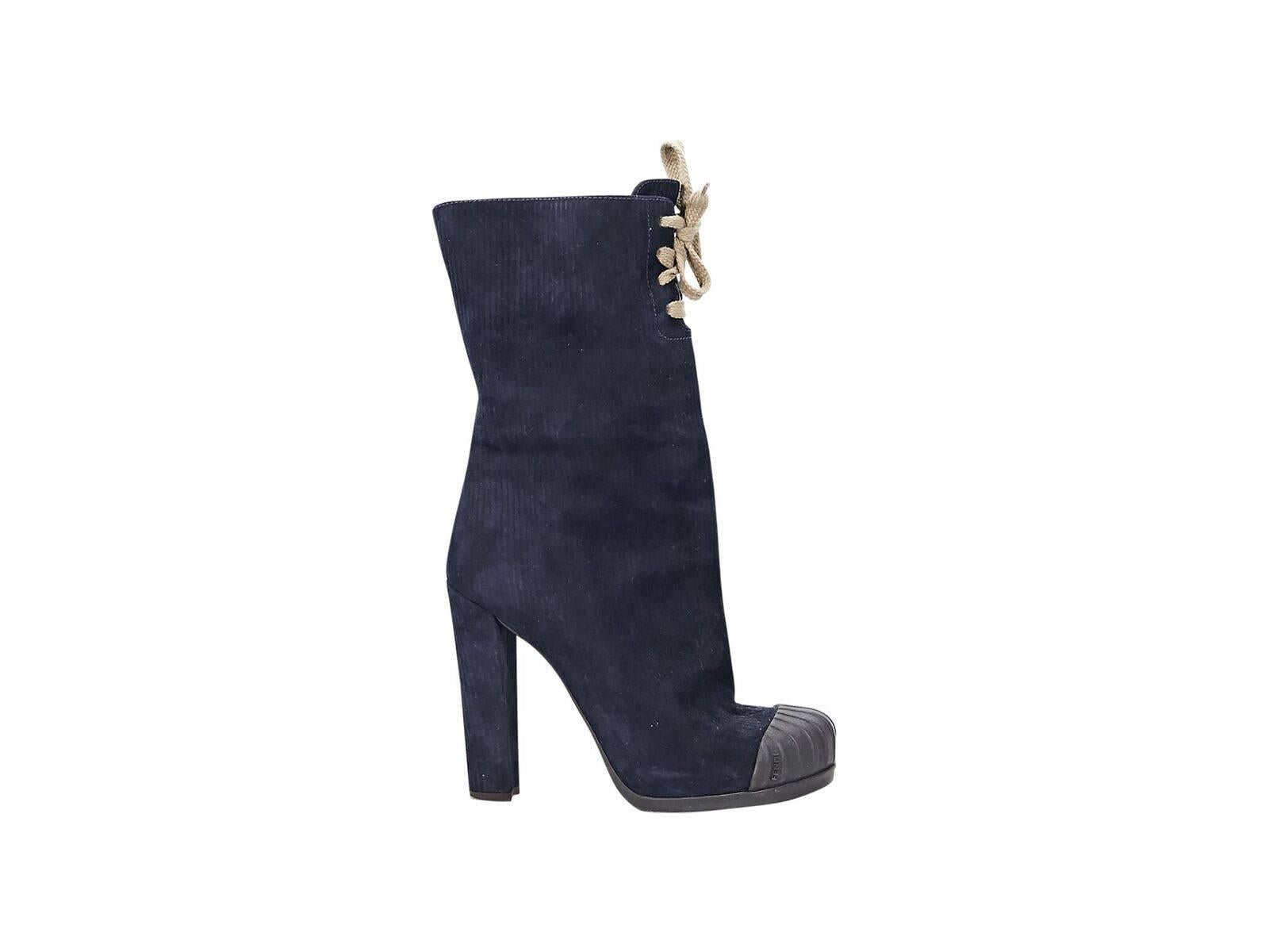 Product details:  Navy blue corduroy mid-calf boots by Fendi.  Rubber cap toe.  Lace-up closure.  
Condition: Pre-owned. Very good.
Est. Retail $528