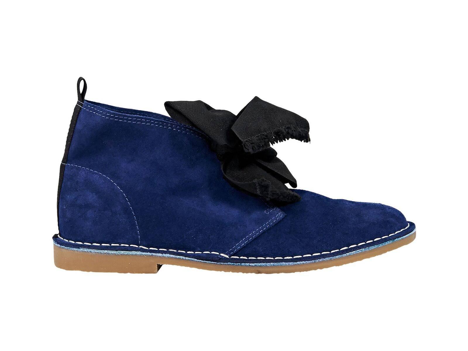 Product details:  Blue suede chukka boots by Frances Valentine.  Round toe.  Tie closure.  
Condition: Pre-owned. Like new- never worn.
Est. Retail $295