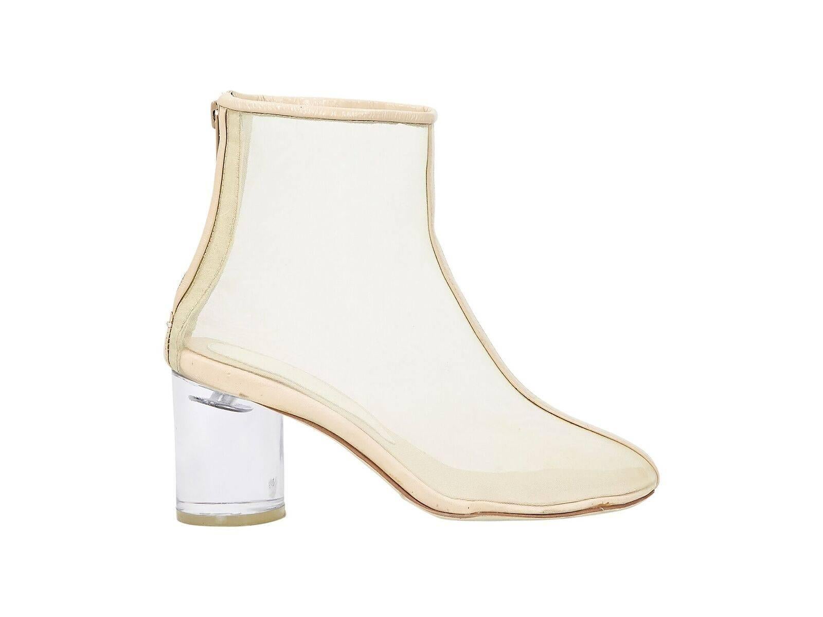 Product details:  Sheer mesh ankle boots by Maison Martin Margiela.  Trimmed with nude leather.  Round toe.  Clear block heel.  Back zip closure.  
Est. Retail $657