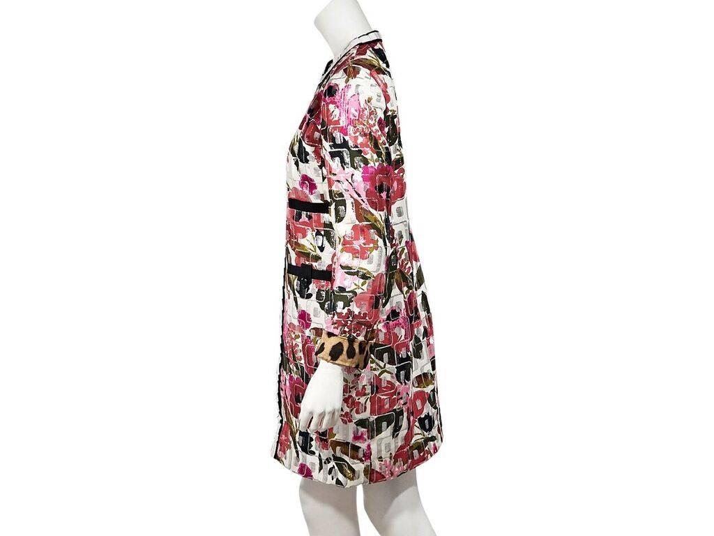 Product details:  Multicolor floral-print coat by Dolce & Gabbana.  Crewneck.  Long sleeves.  Leopard-print cuffs.  Concealed zip-front closure.  Four front patch pockets.  Label size IT 44.  38