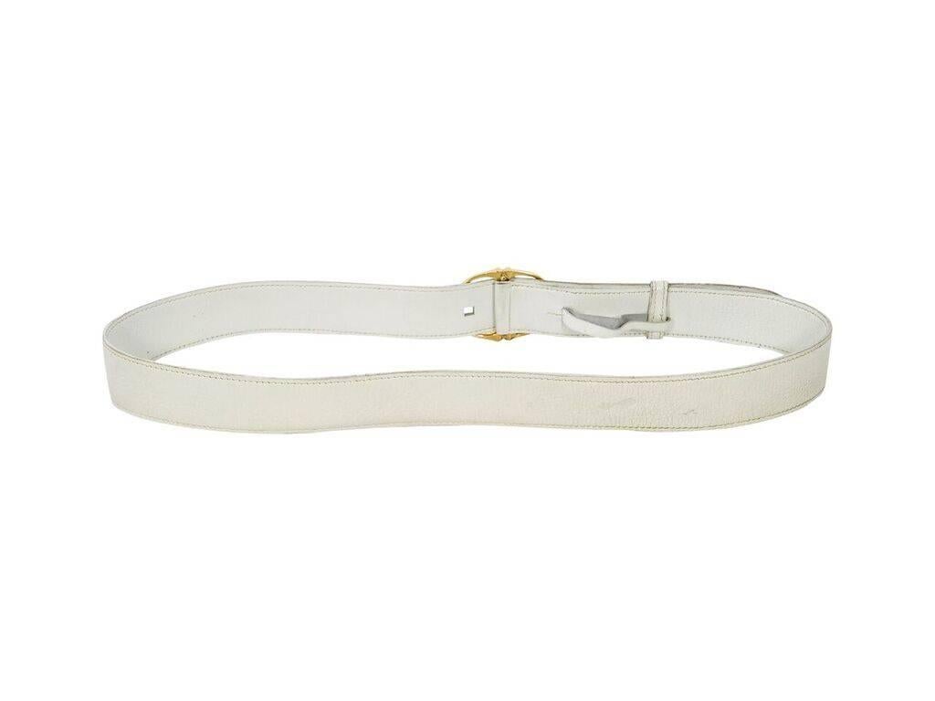 Product details:  Vintage white leather belt by Hermes.  Adjustable buckle closure.  Goldtone hardware.  31