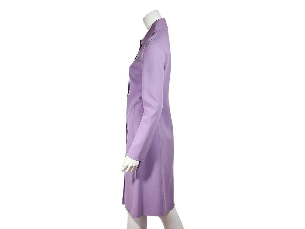 Product details:  Purple stretch-wool coat by Celine.  Spread collar.  Long sleeves.  Button-front closure.  Knee-length hem.  Label size FR 38.  36